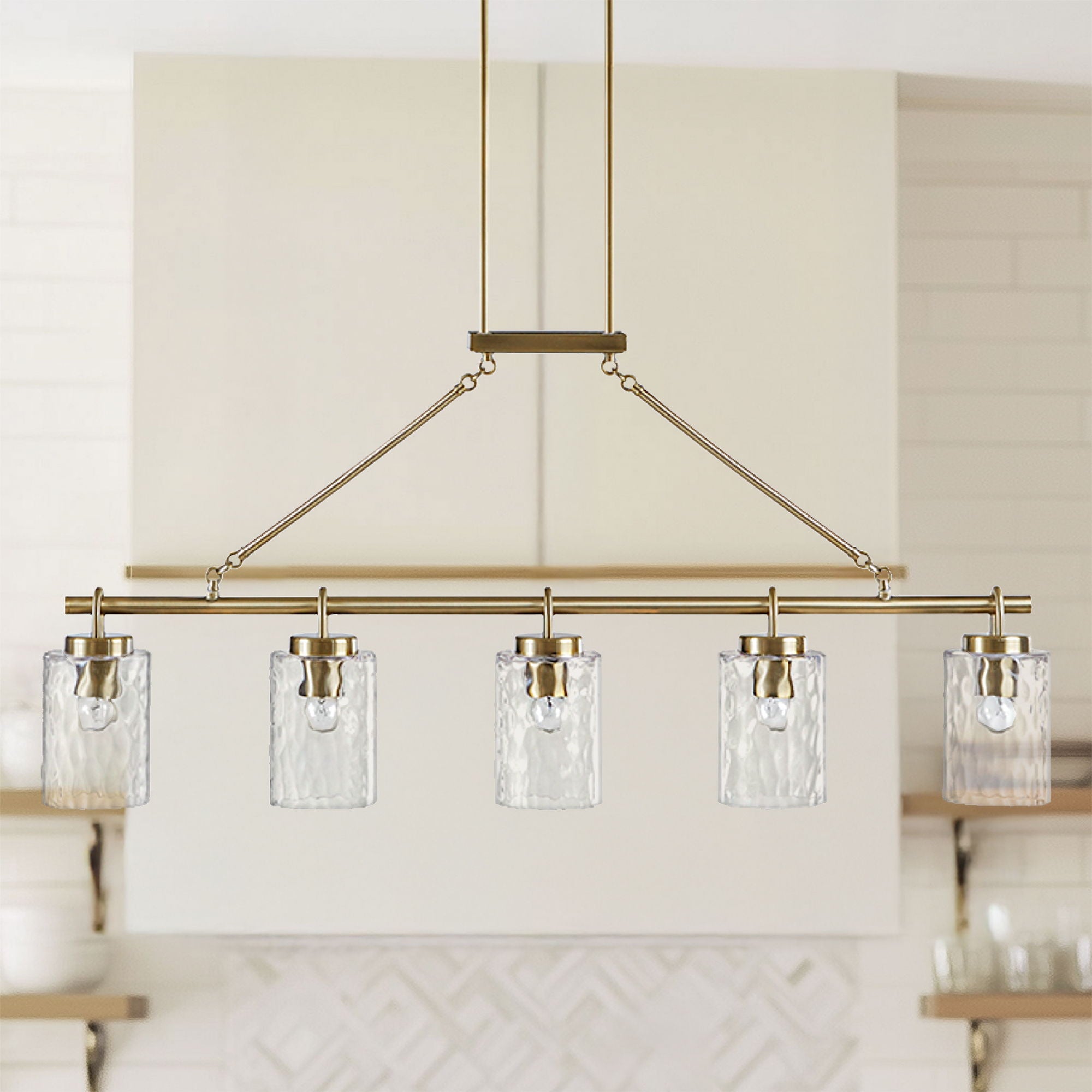 Curiana - 5-Light Linear Chandelier With Textured Glass Shades - Antique Brass