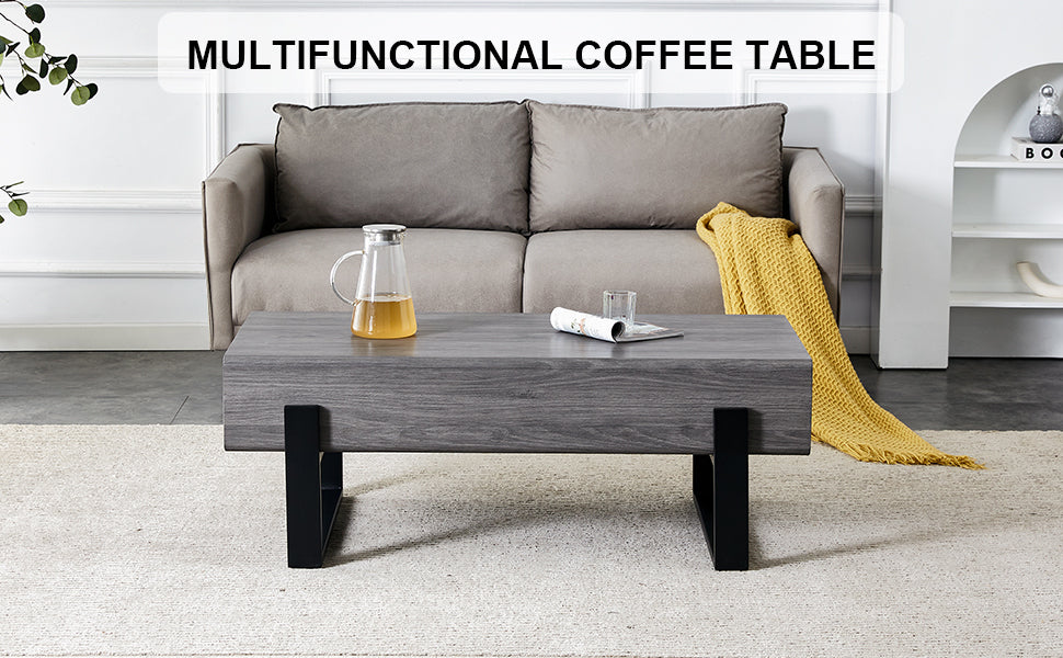 A coffee table made of MDF material. Equipped with drawers made of solid wood material. Can store things and save space. Paired with black metal table legs. Suitable for living room.