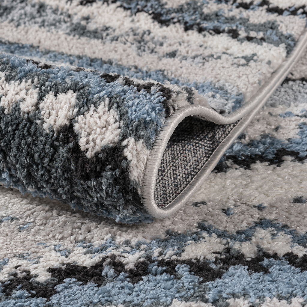 Riley - Watercolor Abstract Stripe Woven 5' x 7' Area Rug - Blue